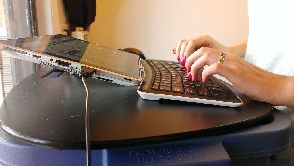 typing-on-keyboard-tablet
