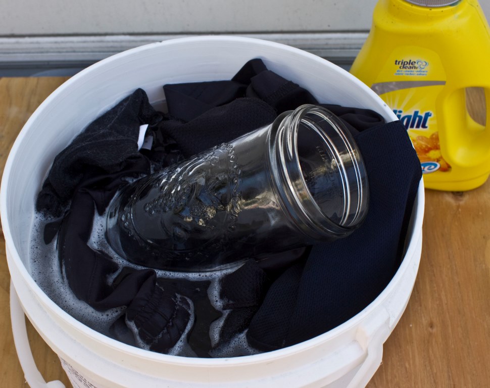 Hand Washing Laundry in a Bucket