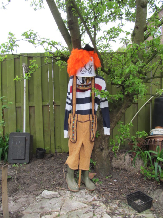 scarecrow bucket orange hair pants boots