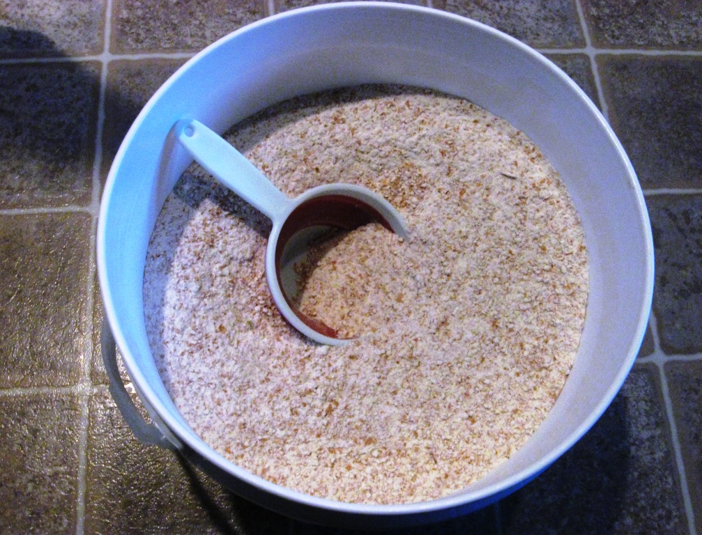 scoop-in-flour-bucket