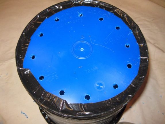 drill holes space bucket bottom irrigation water drainage